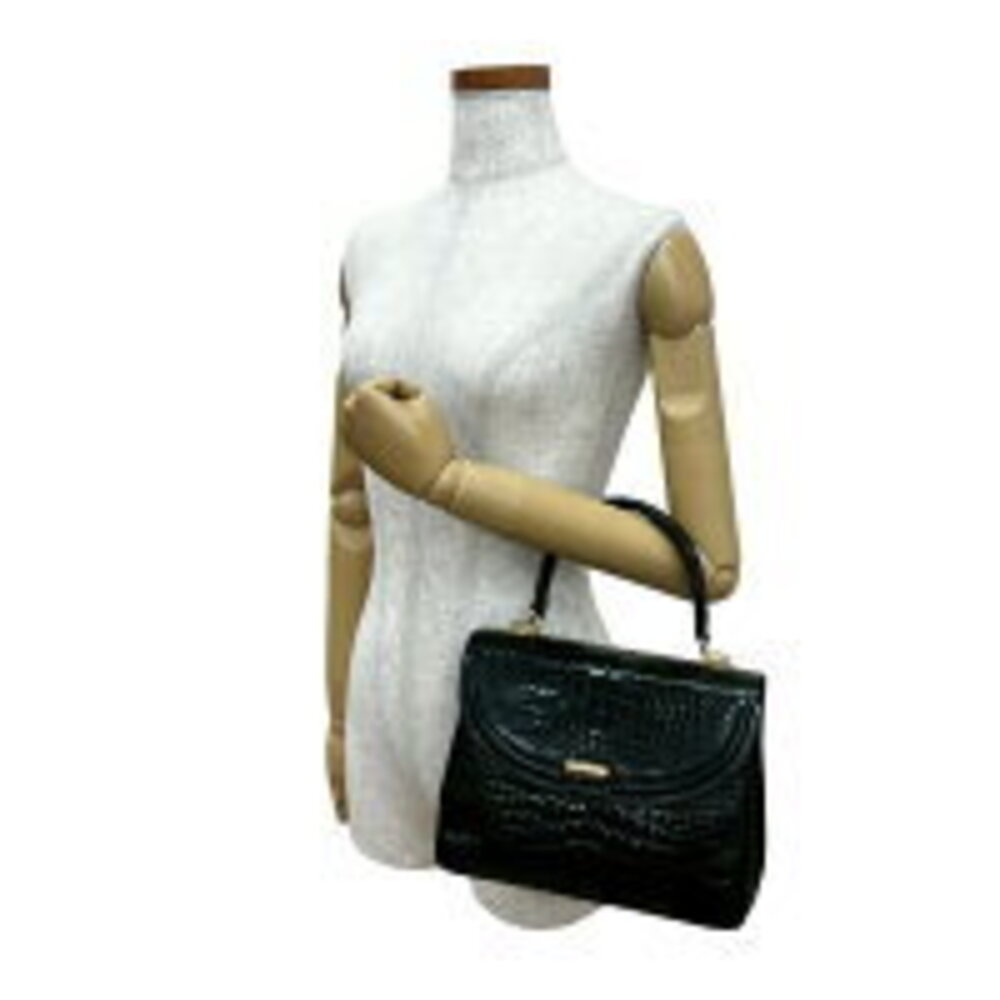 Gucci Crocodile closure turnlock leather black